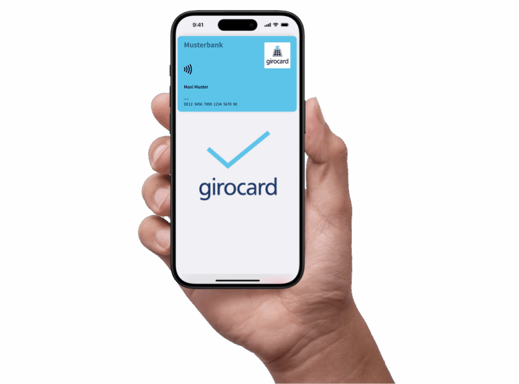 Hand, die ein Smartphone mit einer digitalen girocard anzeigt, auf dem die Kontoinformationen und das Logo der Musterbank sichtbar sind. Die girocard wird zur kontaktlosen Zahlung verwendet.
